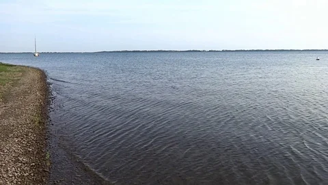 Waves on the surface of the lake Stock Footage 118267662