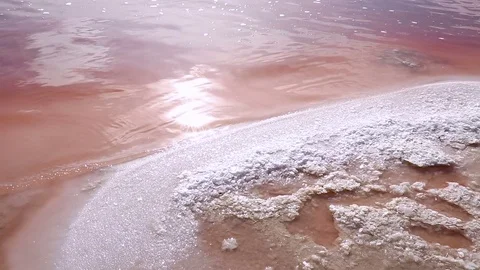 The waves on the surface of the pink salt lake Stock Footage 75250828