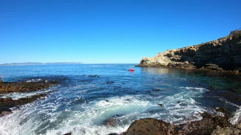 Waves Sweeping Over Rocks at Hermanus Waterfront Stock Footage 312636423