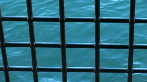 Waves through the bars Stock Footage 22419091