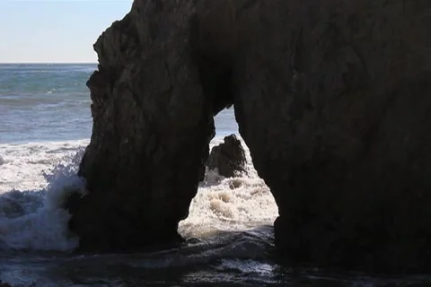 Waves through Rock Stock Footage 4731371