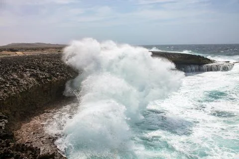 Waves thunder into an underground cave, Boca Tabla, Curacao Stock Photos