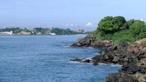 Waves touch rocks at the seaside in Galle, Sri Lanka. Video stock 63958801