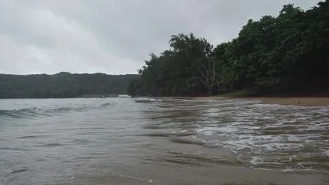 Waves Touching Sandy Beach in Con Dao island, slow motion shot Stock Footage 244131583
