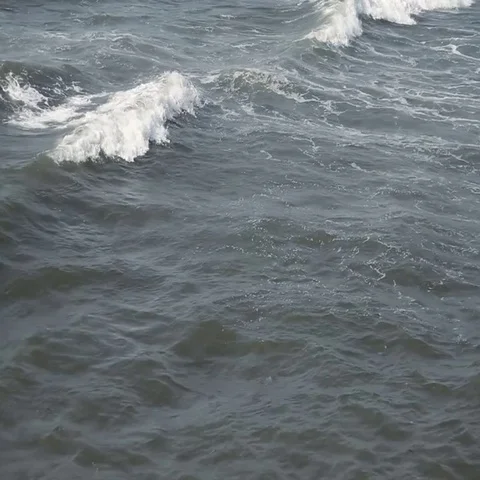 Waves touching sandy beach at sunny day Stock Footage 69603367