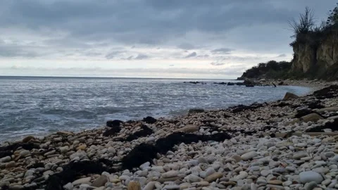 Waves Touching Sandy Shoreline 4K Stock Footage 318795289