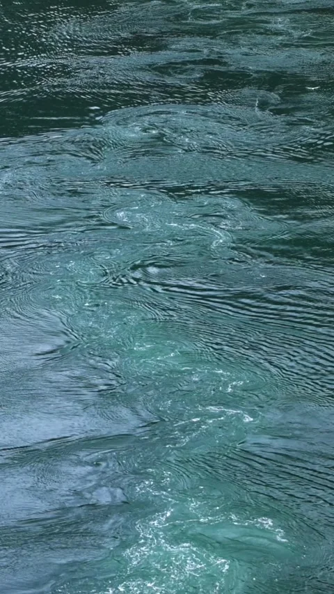 Waves trail behind a cruising ship Stock Footage 313173329