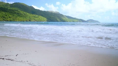 Waves on tropical beach Stock Footage 230130913
