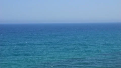 Waves on a turquoise sea, some foaming, from a human perspective. Slow-moti.. Stock Footage 281325318