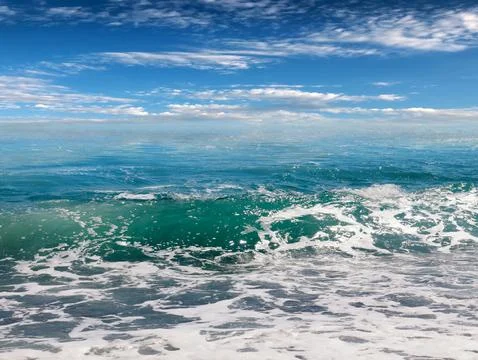 Waves under a sky Stock Photos