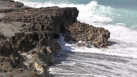 Waves verse Rocks Stock Footage 88972649