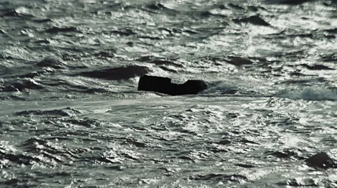 Waves wash concrete protective block set in the sea Stock-Footage 61074103