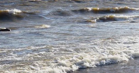 Waves Wash The Sandy Beach And Large Stones And Boulders. Stock-Footage 111418363