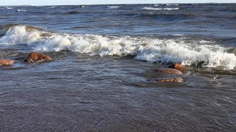 Waves Wash The Sandy Beach And Large Stones And Boulders. Stock-Footage 111418368