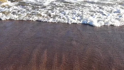 Waves Wash The Sandy Beach And Large Stones And Boulders. Stock Footage 111418382
