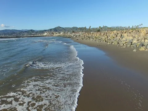 Waves wash onto shore Stock Footage 72495075