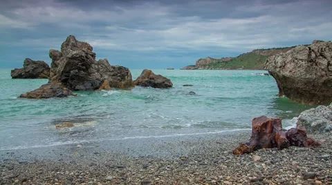 Waves washed coastal stones at spring day Stock Footage 48388816