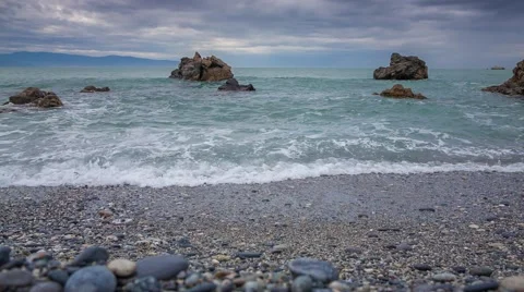 Waves washed coastal stones at spring day Stock Footage 48629318