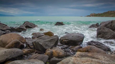 Waves washed coastal stones at spring day. Sicily, Italy, Tyrrhenian sea, Eur Stock Footage 50458473
