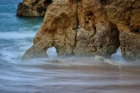 Waves washed rock riffs. Creative diffuse form. Stock Photos