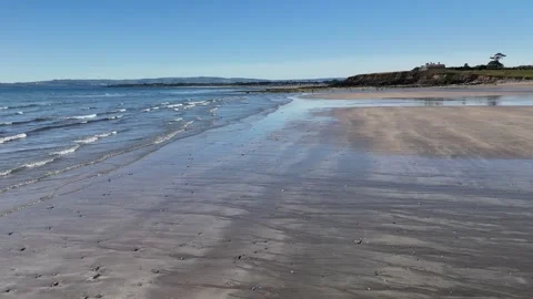 Waves Washing Ashore on Sandy Beach in 4K Stock-Footage 332943824