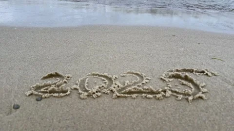 Waves Washing Away 2025 in Sand Concept of Letting Go and Time Passing Video stock 336468013