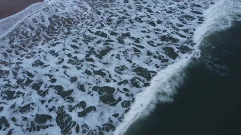 Waves washing on beach from above Stock Footage 312026951