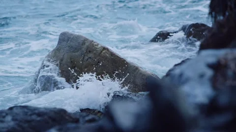 Waves Washing over Large Boulders, Turquoise Coastal Water, Slow Motion Close-Up Stock Footage 341584813