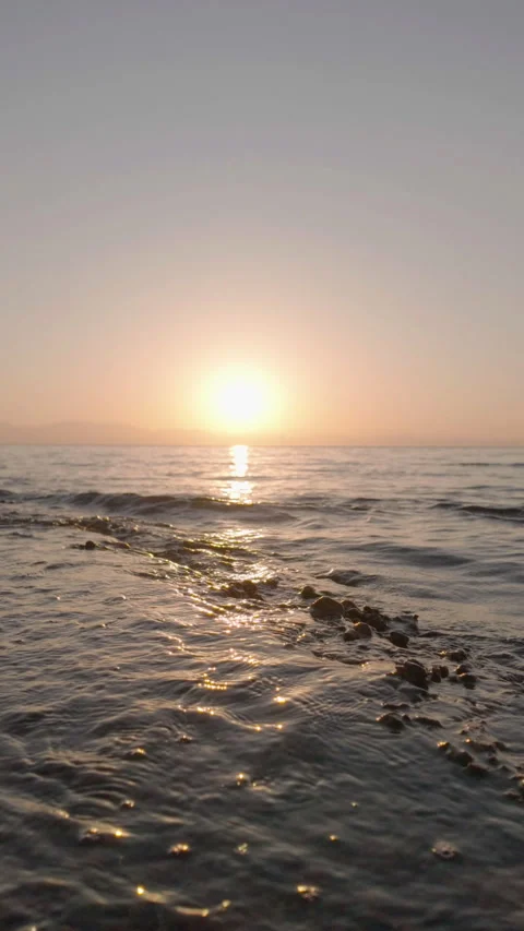 Waves Washing Over Rocky Shore at Sunrise, Red Sea Stock Footage 343325534