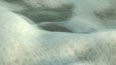 Waves washing onto pebble beach Stock Footage 85596