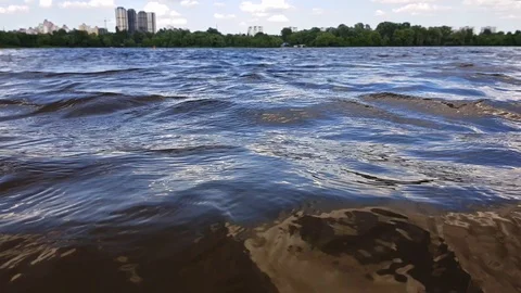 Waves on the water and soft clouds in the sky. Kiev, Ukraine Stock Footage 112028642