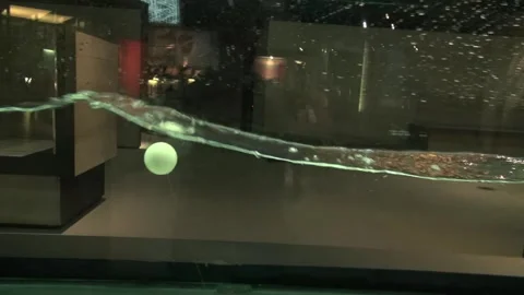 Waves water ball buoy float marker motion experiment science museum Stock Footage 327207176