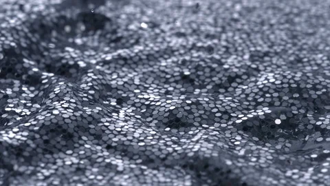 Waves in water filled with glitter, Slow Motion Stock Footage 85653323