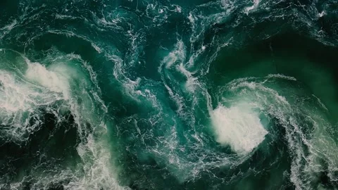 Waves of water of the river and the sea meet each other during high tide an.. 動画素材 329845863