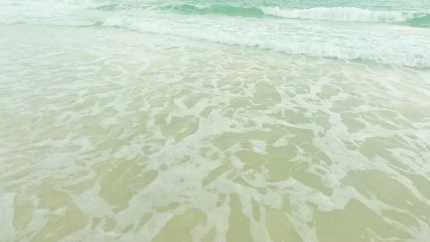 The waves water sea crashed into the beach until it formed a sponge Stock Footage 193986026
