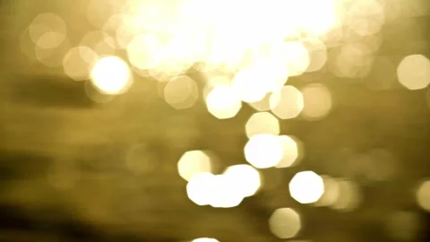 Waves on the water surface of the lake at sunset 動画素材 257171339