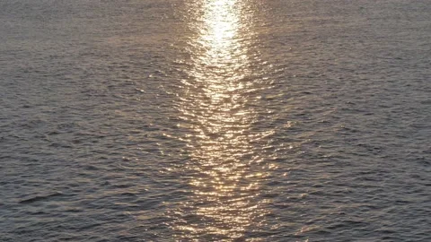 Waves on water surface of river at beautiful soft sunset. River flow at sunset. Stock Footage 185274595