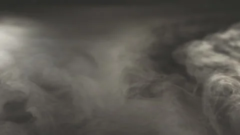 Waves of white smoke on a black surface Stock Footage 222022491