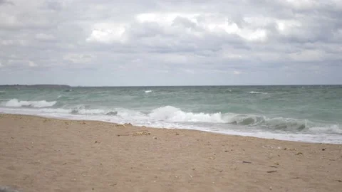 Waves on a wild beach - windy day Stock Footage 142190593