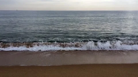 Waves at windy day hit beach Video stock 59658847