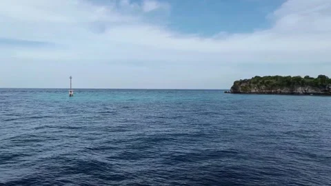 Wavey seas, islands and clear skies Stock Footage 297034997