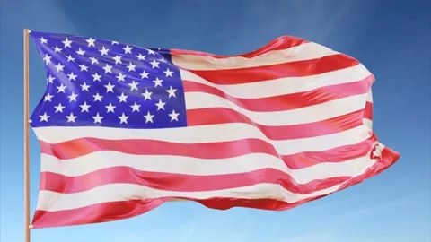 Waving american flag on flagpole in slow motion, close up - blue sky Stock Footage 148997396