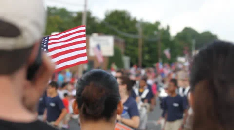 Waving American Flag At Parade Stock Footage