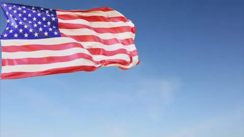 Waving american flag in slow motion, close up - blue sky Stock Footage 148997519