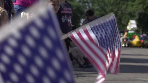 Waving American Flags along 4th of July parade route 4k Stock-Footage 90681667