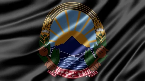 Waving black flag displaying national emblem of North Macedonia Stock Footage 344313942