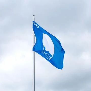 Waving blue flag Stock Photos