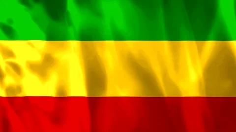Waving fabric flag with horizontal stripes of green yellow and red colors Video stock 343581931