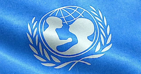 Waving fabric texture of the flag with blue and white color of unicef Stock Footage 69864252