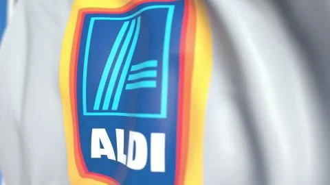 Waving flag with Aldi logo, close-up. Editorial 3D rendering Stock-Illustration